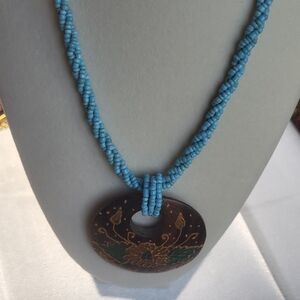 Beautiful Handcrafted Blue Beaded Necklace with Floral Pendant